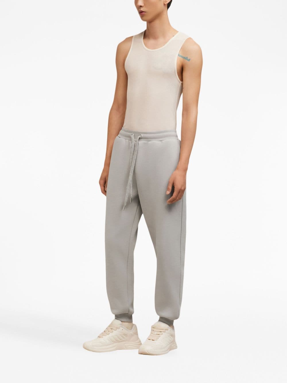 PANTALON JOGGING GRIS PARCHE GRIS LOGO