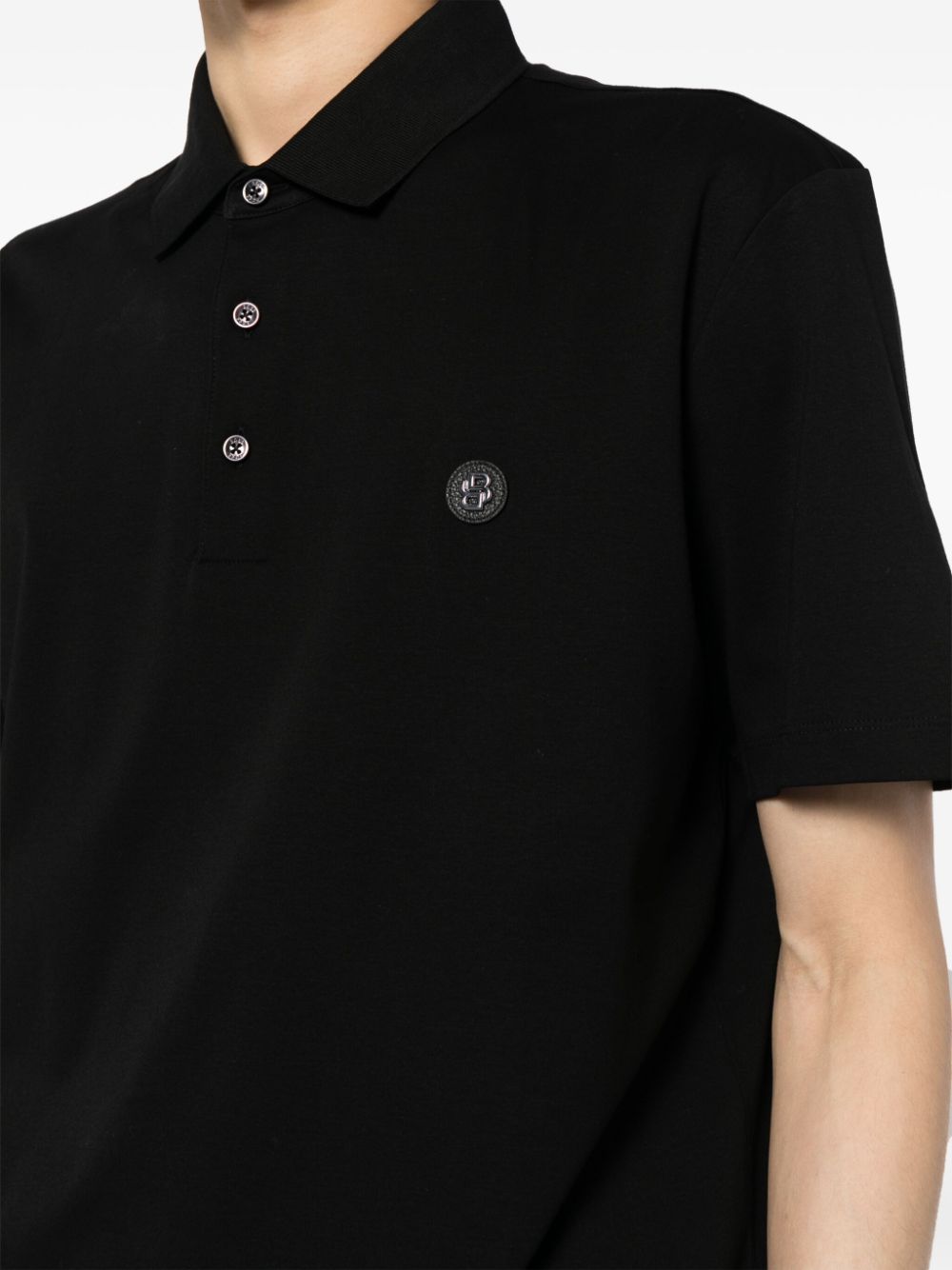 POLO MC CPARRIS NEGRO LOGO METALICO