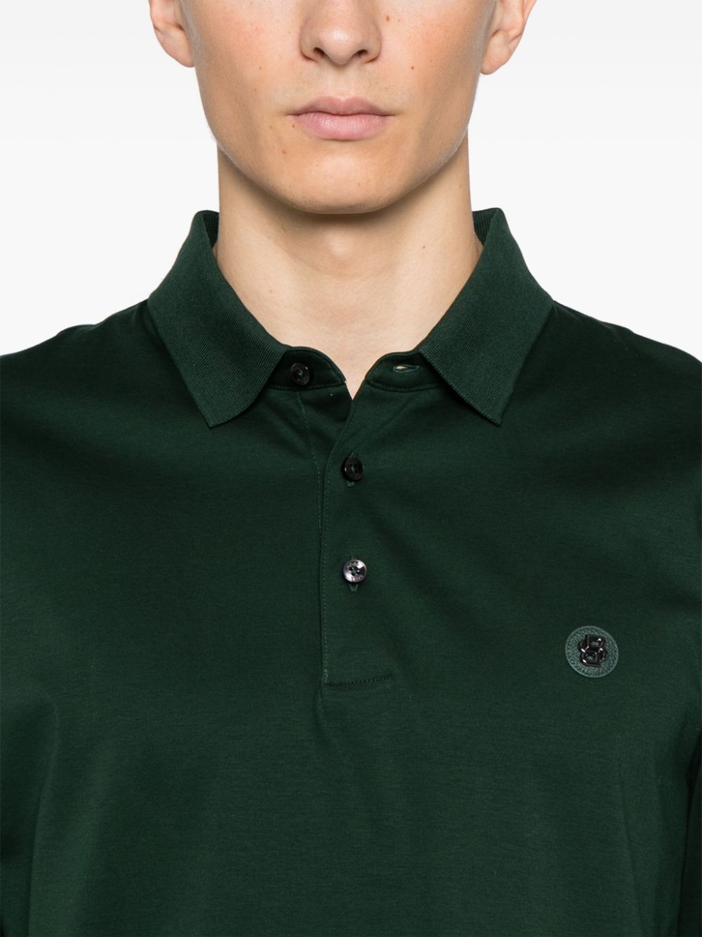 POLO ML CPALEY VERDE BOTELLA LOGO METAL