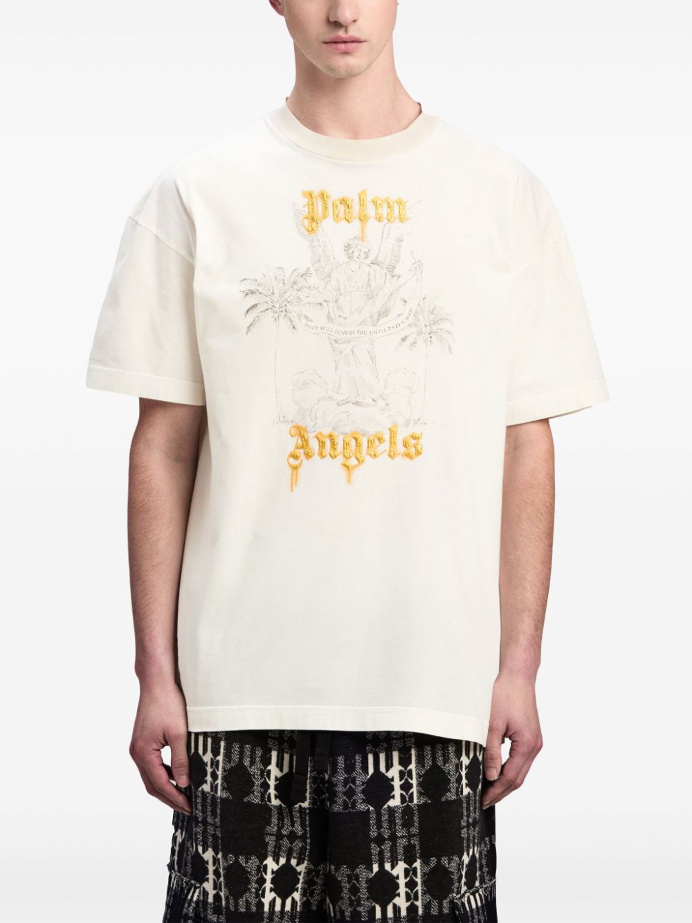 CAMISETA MC ANGEL PENCIL BLANCA CUELLO 