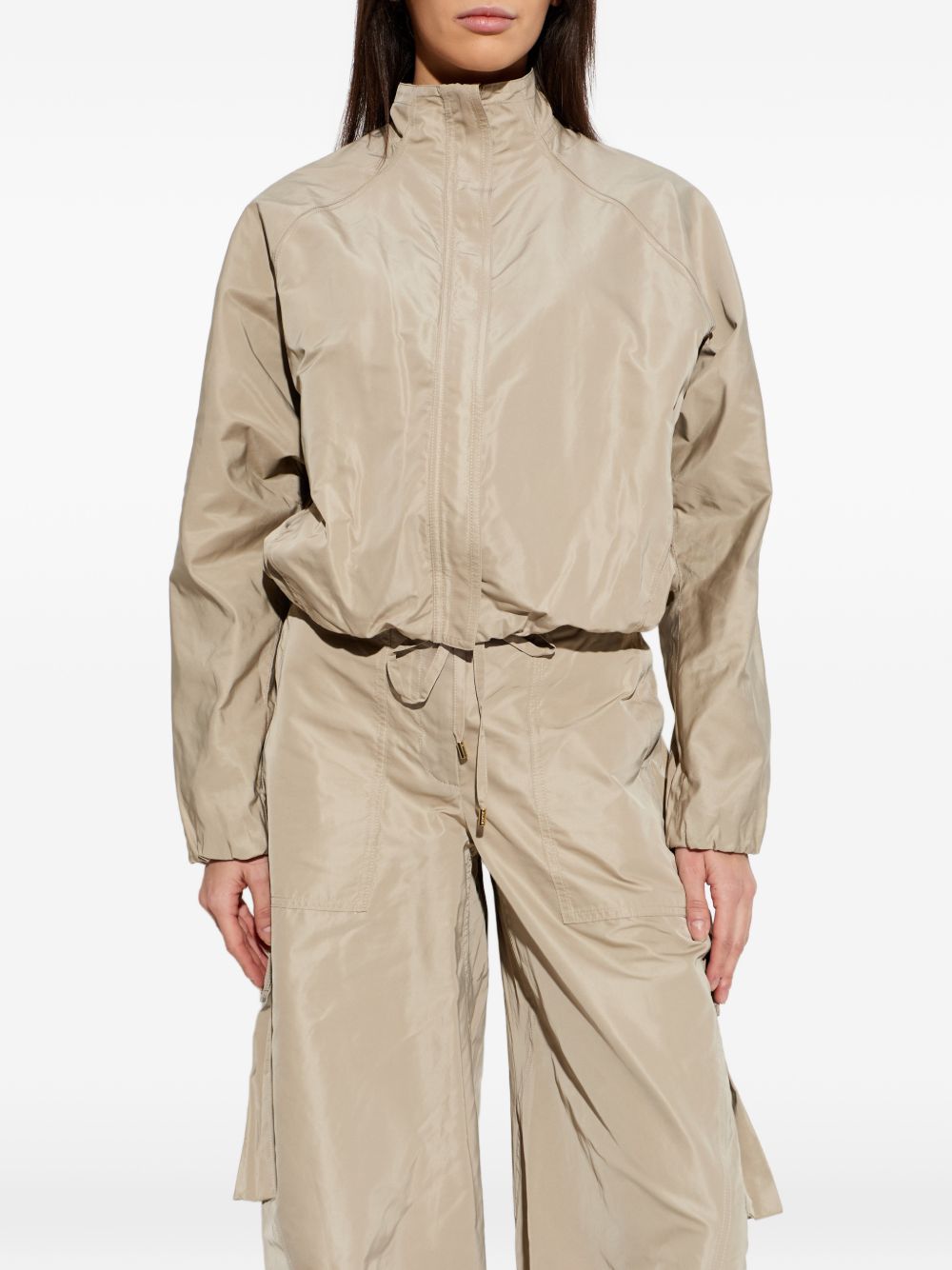 CHAQUETA CORTAVIENTOS BEIGE