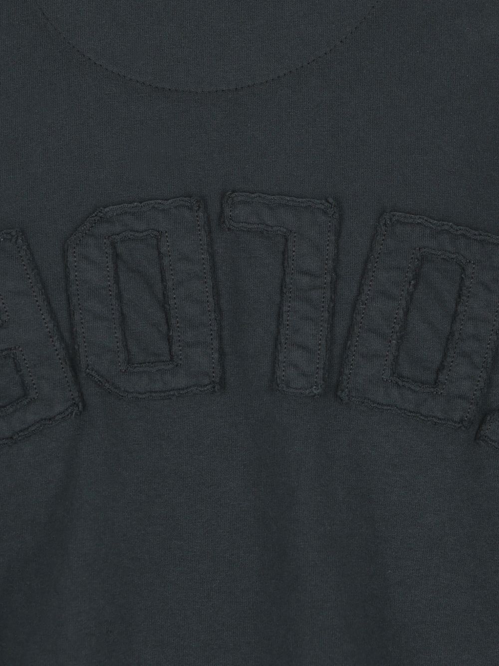 CAMISETA MC NEGRA WASH ESTRELLAS METAL