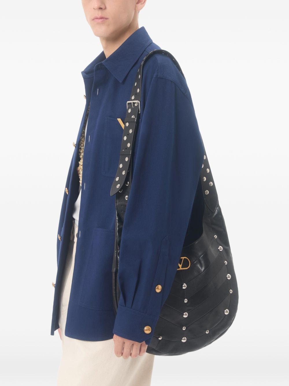 SOBRECAMISA AZUL BOLSILLOS LOGO DORADO